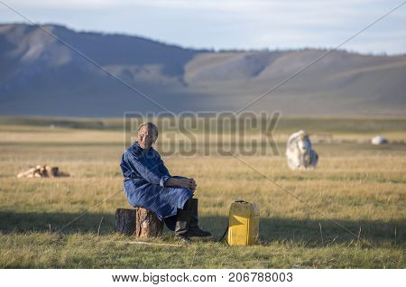huvsgul Mongolia September 6th 2017: mongolian woman resting outside her ger