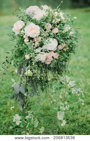 colomn with flowers for werdding ceremony in fine art style