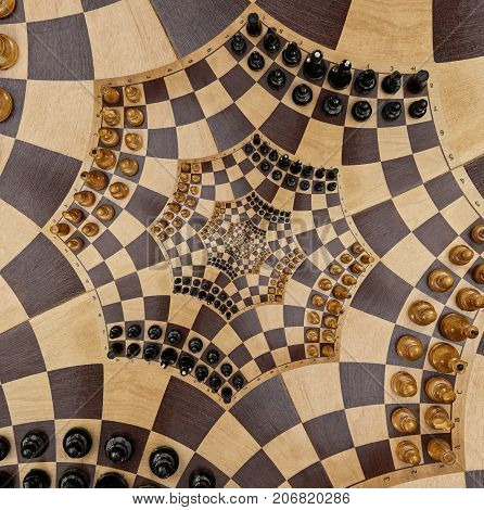 Abstract wooden chess desk white black figures spiral star shape effect. Chess wooden board abstract spiral fractal Surreal chess board figures spiral background pattern incredible fractal effect Chess game