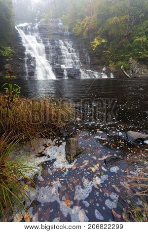 Morning fog at Barberville Falls in Autumn