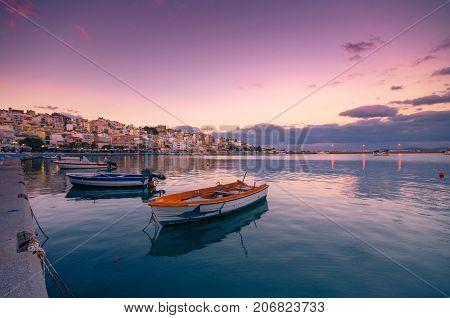 The pictursque port of Sitia, Crete, Greece at sunset. Sitia is a traditional town at the east Crete near the beach of palm trees, Vai.