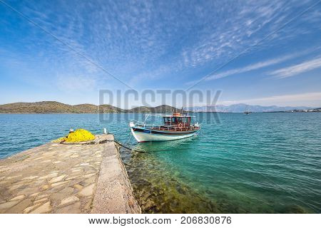 Sailing boat anchored in the peaceful gulf of Elounda, Crete.