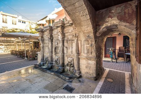 The Rimondi Fountain in the centre of the old town of Rethymnon, Crete, Greece, on April 10, 2017.