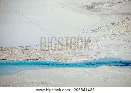 Amazing view of Balos Lagoon with magical turquoise waters, lagoons, tropical beaches of pure white sand and Gramvousa island on Crete, Greece