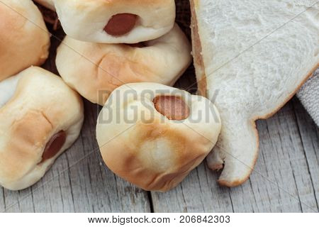 Baked bread and more on a wooden.