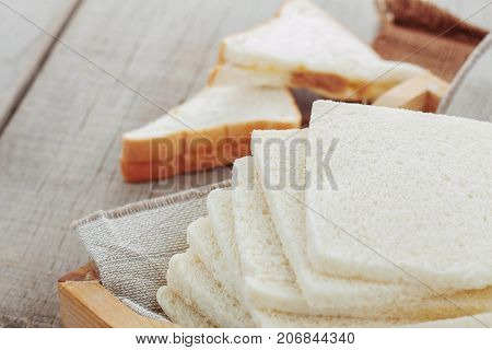 White Bread Placed On A Wooden Tray.