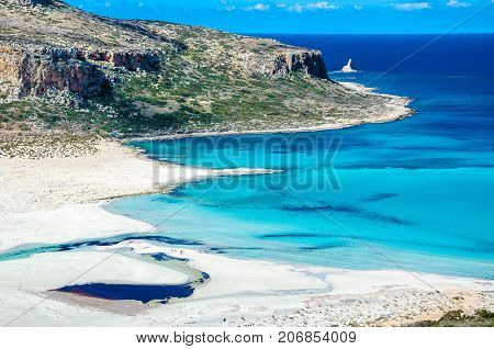 Amazing view of Balos Lagoon with magical turquoise waters, lagoons, tropical beaches of pure white sand and Gramvousa island on Crete, Greece