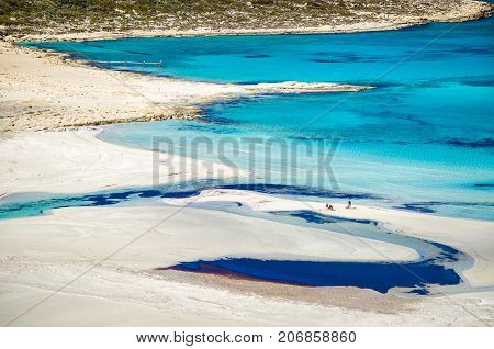 Amazing view of Balos Lagoon with magical turquoise waters, lagoons, tropical beaches of pure white sand and Gramvousa island on Crete, Greece