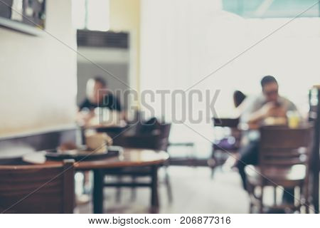 Blurred Background,people In Coffee Shop Blur Background With Bokeh Light With Vintage Filter