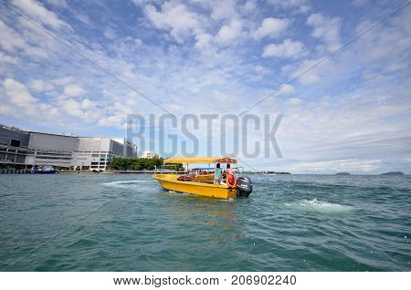 KOTA KINABALU MALAYSIA- 24 JUN 2017: View of tourist boats at Jetty Jesselton Point Kota Kinabalu Sabah. This jetty provided tourists facilities to the islands in Tunku Abdul Rahman Marine Park nearby.