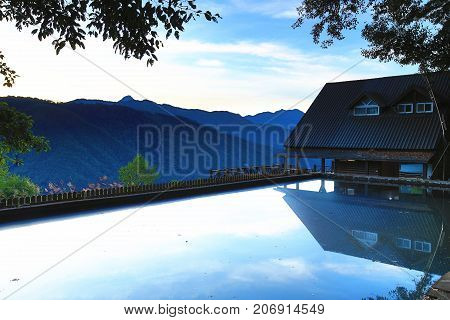 Beautiful dawn landscape with mountains and lake