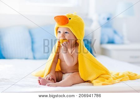 Cute Baby After Bath In Yellow Duck Towel