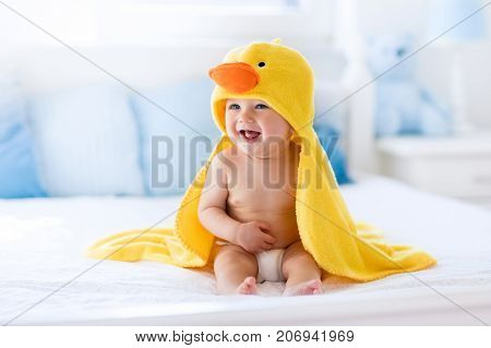 Cute Baby After Bath In Yellow Duck Towel