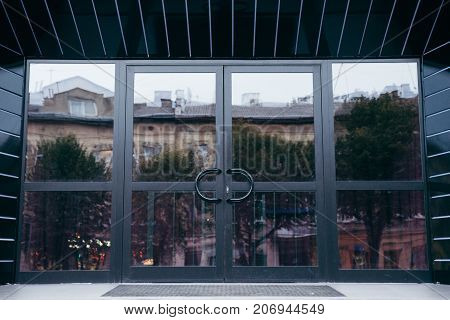 Outside office black modern solid glass door
