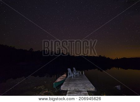 Canoe At Dock Under A September Night Sky - Ontario, Canada