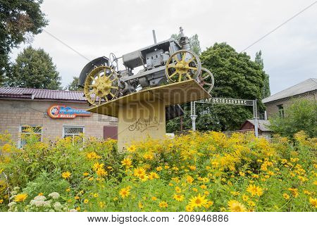 Konotop UKRAINE -August 15 2013:Tractor Universal-2 on a pedestal.City Konotop Sumy region Ukraine