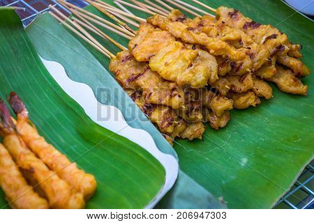 Shrimp satay and prok satay (Thai food style)
