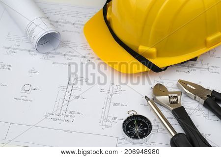 engineer construction business work concept : engineering blueprint diagrams paper drafting and industrial equipment technical tools selective focus