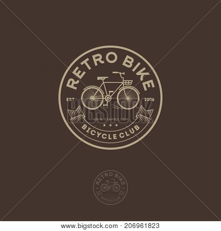 Retro bike logo. Cycling club emblem. Letters, ribbon and bicycle in the circle.