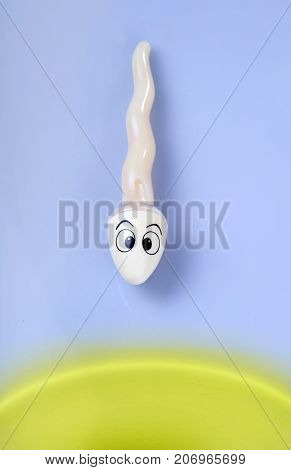 sperms (object) compete on blue background