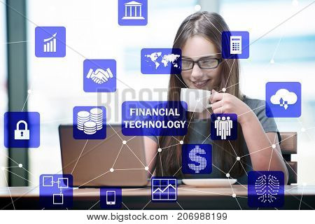 Businesswoman with computer in financial technology fintech conc