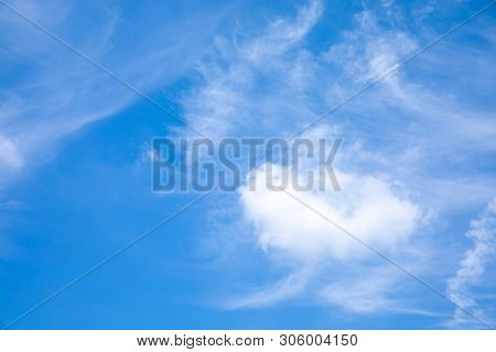 Deep Blue Sunny Sky With White Clouds. Blue Sky With Cloud Closeup. White Fluffy Clouds In The Blue 