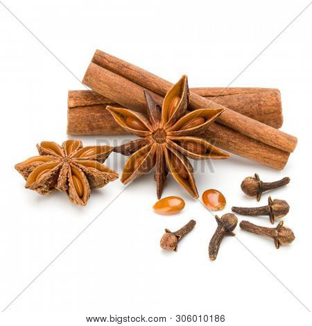 Cinnamon sticks and anise star isolated on white background close up
