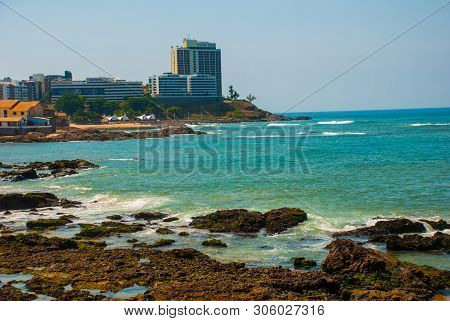 Salvador, Brazil: Landscape With Views Of The Beach, Rocks And Skyscrapers