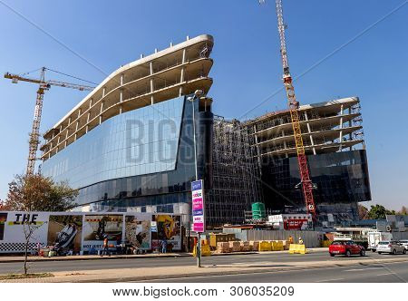 Johannesburg, South Africa, 21st May- 2019: Office Building Under Construction With Cranes And Scaff