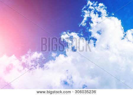 White Clouds In Turquoise Sky Background. Summertime Cloudscape Photographed In Golden Hour. Beautif