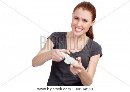Emotiva femmina del giocatore con un controller di gioco. Isolated on white background