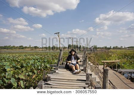 Travelers Thai Women People Travel Visit And Posing Portrait For Take Photo On Kae Dam Long Wood Bri