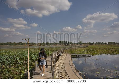 Travelers Thai Women People Travel Visit And Posing Portrait For Take Photo On Kae Dam Long Wood Bri