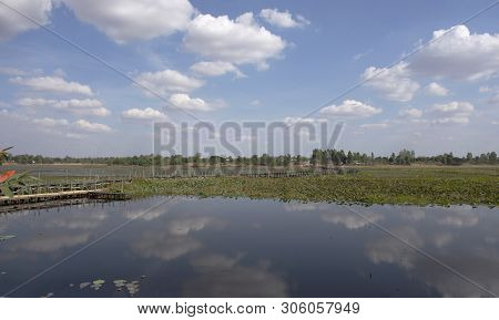Kae Dam Long Wooden Bridge For Walking Travel And Visit In Maha Sarakham Province, Northeastern Thai