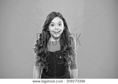 Kid Girl Long Healthy Shiny Hair Wear Casual Clothes. Little Girl Excited Happy Face. Kid Happy Cute