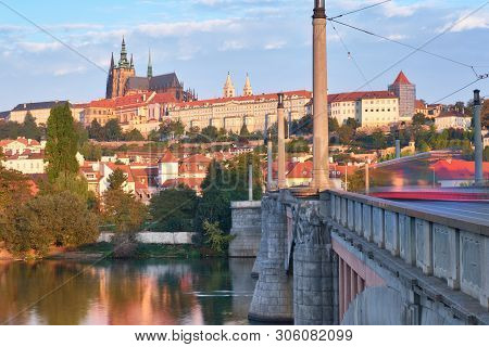 Manes Bridge (manesuv Most) And Famous Prague Castle On The Background In Prague, Czech Republic. Bl