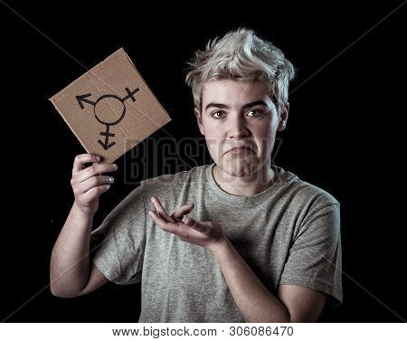 Portrait Of Happy Proud And Confident Trans Teenager Man Holding Transgender Symbol