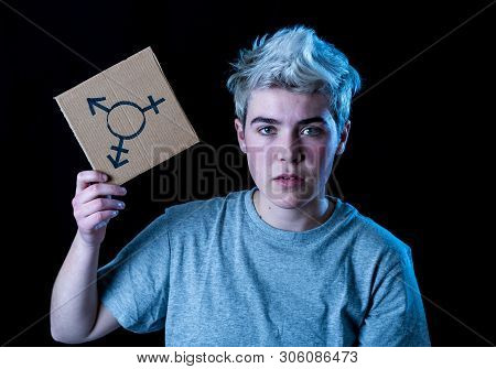 Portrait Of Happy Proud And Confident Trans Teenager Man Holding Transgender Symbol
