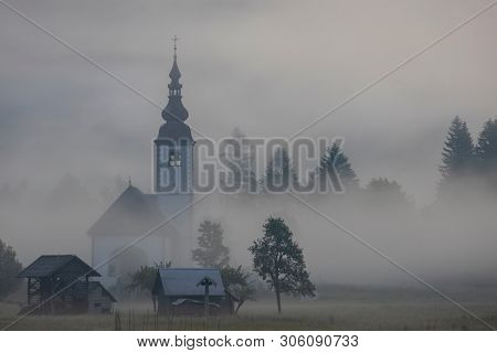 morning fog in river valley Sava Bohinjka, Slovenia
