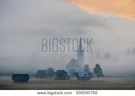 morning fog in river valley Sava Bohinjka, Slovenia