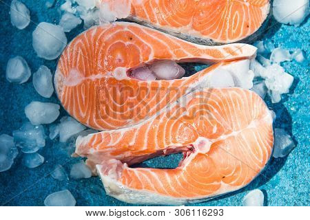 Clipping Path Fresh Salmon Steak On Concrete Blue Background With Basil And Iced. Salmon Red Fish St