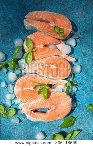 Clipping Path Fresh Salmon Steak On Wooden Background. Salmon Red Fish Steak. Large Pile Of Salmon S