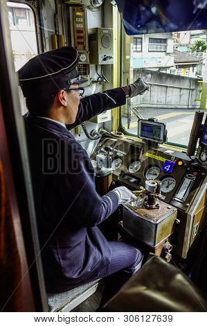 Driver Working In The Cockpit Of Train
