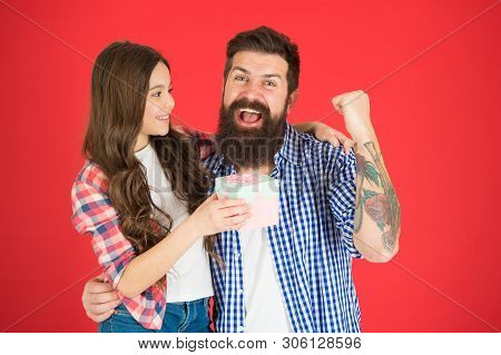 Gift For Her Dad. Man Bearded Father And Cute Little Girl Daughter On Red Background. Celebrate Fath
