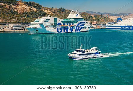 Barcelona, Spain - March 30, 2016: Pleasure Boat And Cruise Ships Gnv, Grimaldi Lines In Sea. Water 