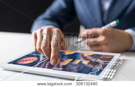Businessman Analysis Trading Diagram At Tablet Computer. Professional Banking And Investment Service