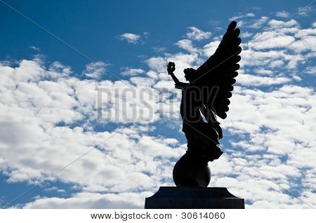 Silhouette angel statue