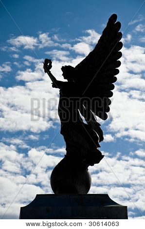 Silhouette angel statue