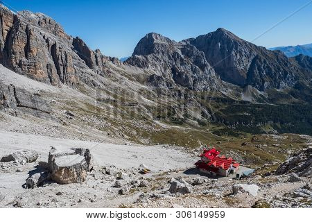 Tourist With Hiking Backpacks In Mountain Hike On Summer Day. Man Traveler Hiking In Beautiful Mount