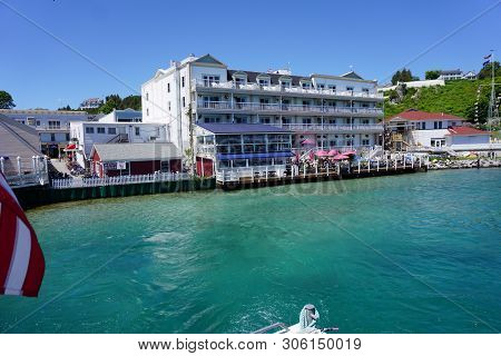 Mackinac Island, Michigan / United States - June 11, 2018: Customers Enjoy An Outdoor Breakfast At T